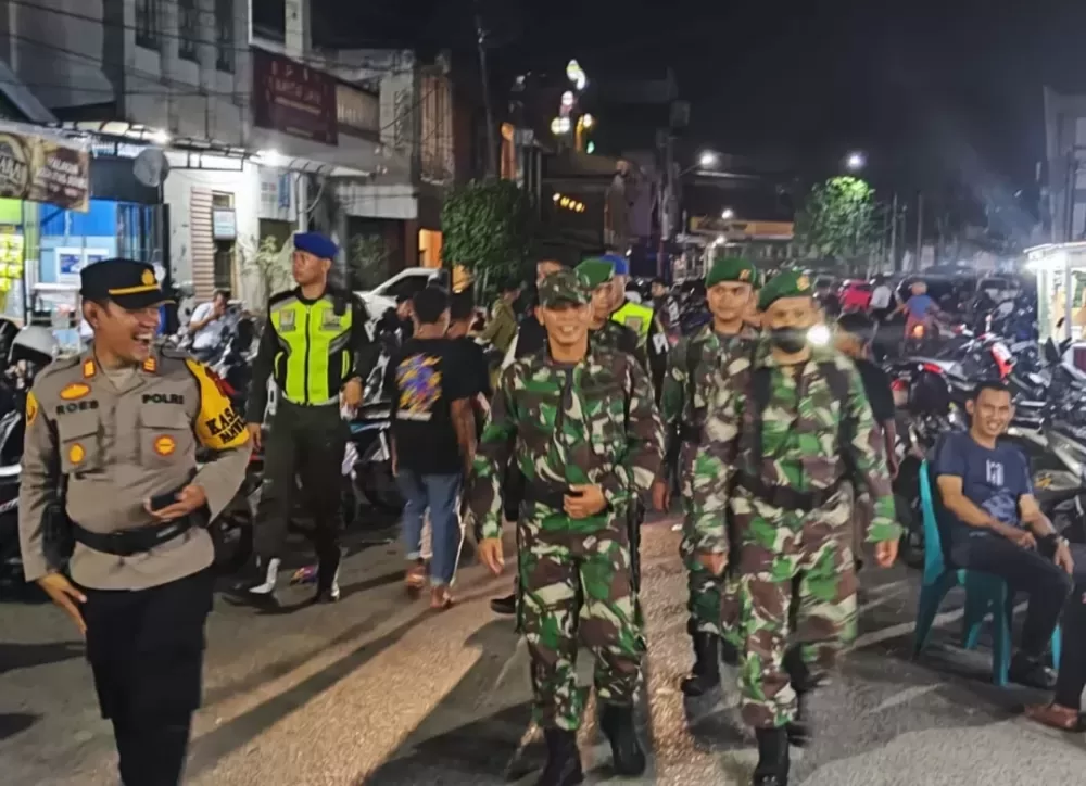 TNI-Polri Kompak Amankan Berbagai Nasional di Kota Palu
