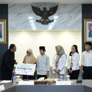 Wafat saat Bertugas Haji, Keluarga Ahmad Ridlo Terima Klaim Jaminan Kecelakaan Kerja