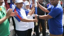 Masyarakat Lawang Sambut Meriah Kirap Obor Api Porprov lX