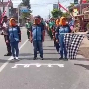 Bakar Semangat Juang HUT RI ke 80, Lembaga Masyarakat dan Sekolah di Balung Jember Giat Gerak Jalan .