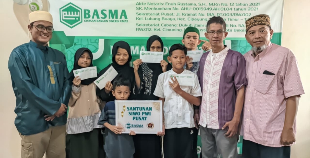 Cerianya Kimiko dan Rahman Menerima Santunan dari SIWO PWI Pusat